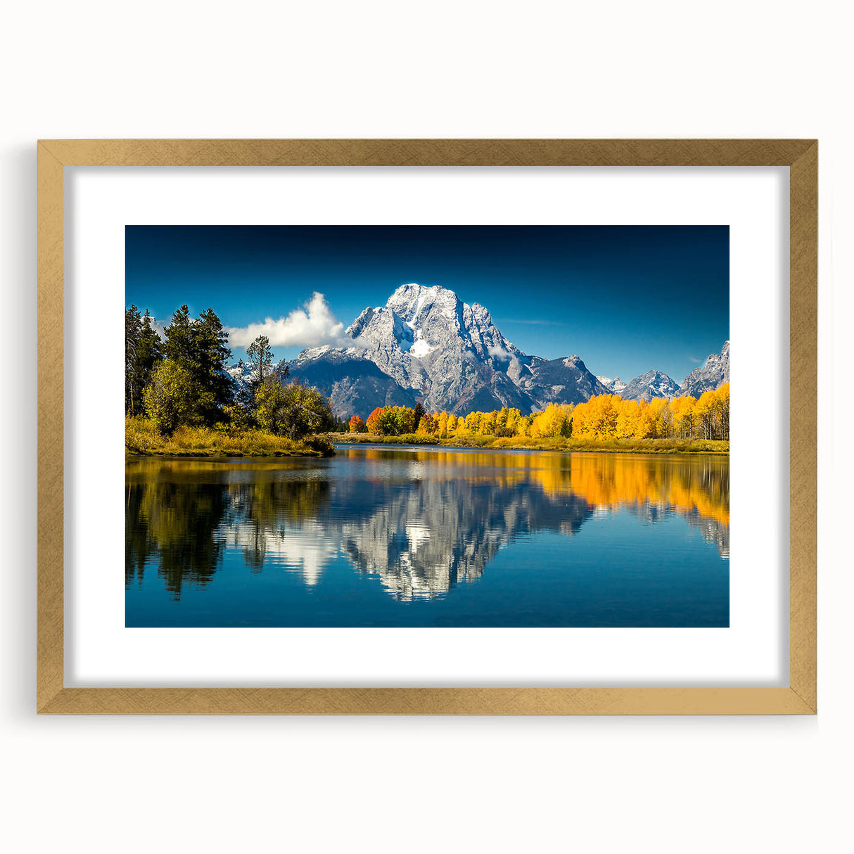 Extra large wall art of the Grand Tetons in Wyoming, featuring textured abstract prints in a gold frame.