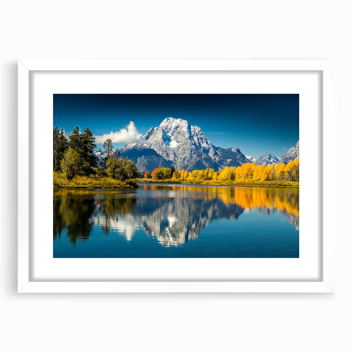 Abstract art print of Wyoming's Grand Tetons in muted earth tones on a framed white mat, ideal for dining room decor.
