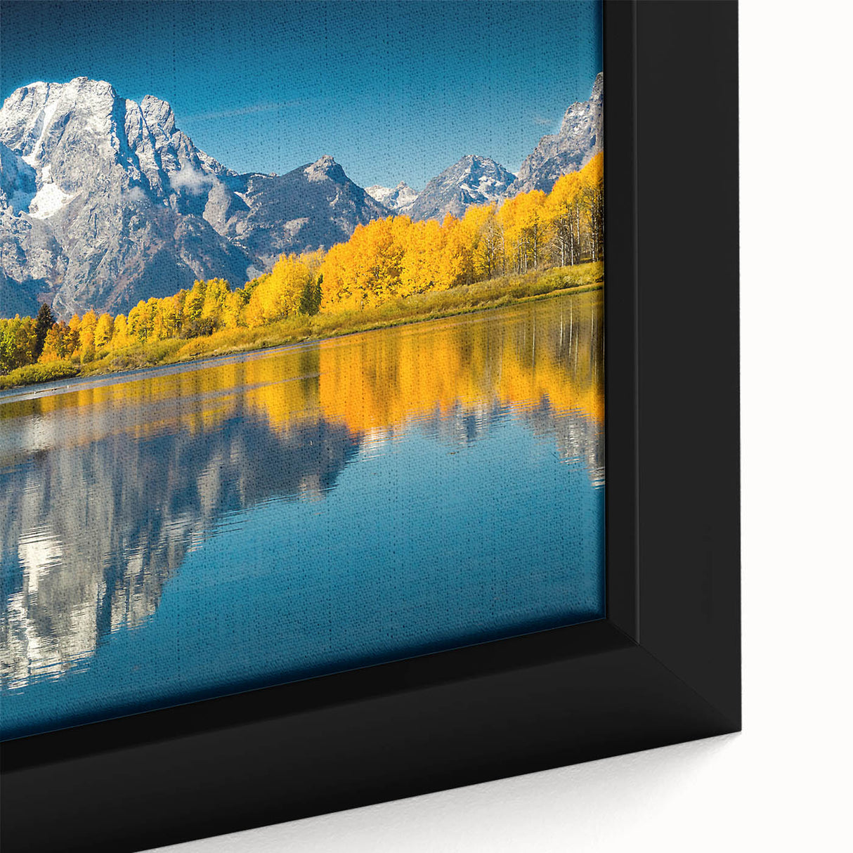 Extra large framed canvas of the Grand Tetons in Wyoming, featuring textured black and colorful art.