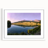 Abstract art print of Yellowstone scenery in muted earth tones on a white framed mat, suitable for dining room decor.