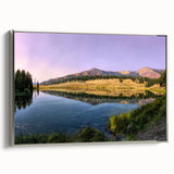 Framed canvas print of Yellowstone landscape with a vintage poster style, featuring a palette of vibrant greens and blues.