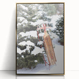Large art print of a winter scene with muted blue and white colors, framed in gold acrylic, in mid-century modernist style.