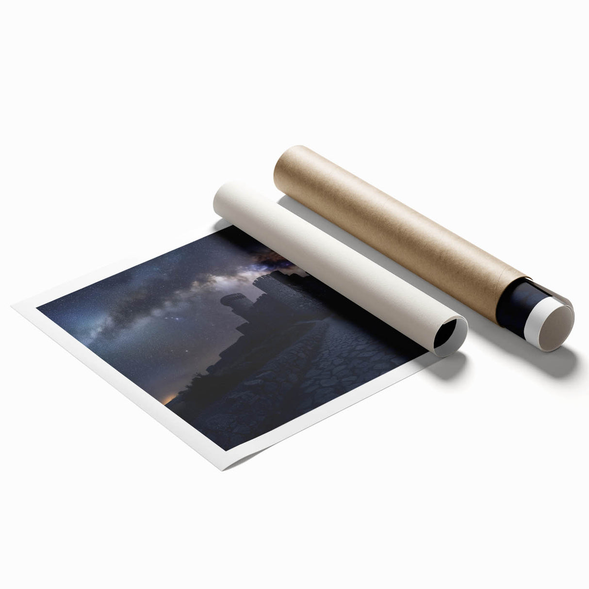 Rolled print showcasing a serene landscape with a majestic castle set against lush greenery and a clear blue sky, packaged securely for delivery.