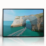 Framed acrylic artwork showcasing a dramatic landscape of cliffs, with a sleek black frame, designed to enhance modern home decor and evoke a sense of adventure.