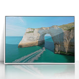 Framed acrylic artwork depicting a stunning landscape of cliffs with vibrant colors and intricate details, set in a sleek white frame, perfect for home decor.