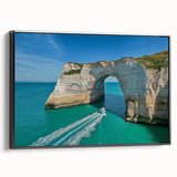 Framed canvas artwork displaying a scenic landscape of dramatic cliffs, featuring rich colors and intricate detailing, presented in a sleek black frame for an elegant touch.