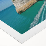 Stunning rolled canvas print showcasing a vibrant landscape of cliffs under a bright blue sky, ideal for home decor or art enthusiasts, packaged securely for delivery.