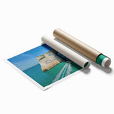 Stunning rolled print of a coastal landscape showcasing dramatic cliffs and vibrant blue ocean waves, elegantly packaged in a protective cardboard tube. Perfect for home decor enthusiasts seeking nature-inspired art.