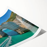 Stunning landscape artwork print showcasing dramatic cliffs against a vibrant sunset, rolled for easy transport and display in a stylish home or office setting.