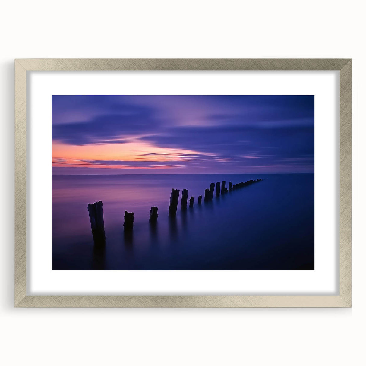 Landscape frame showcasing a scenic beach view, elegantly bordered with a silver mat, perfect for home decor. Ideal for coastal-themed interiors and art lovers.