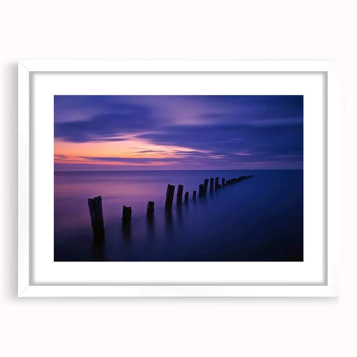 Landscape frame showcasing a serene beach scene with a crisp white matting, perfect for enhancing coastal decor in homes or offices. Ideal for art lovers seeking a tranquil aesthetic.