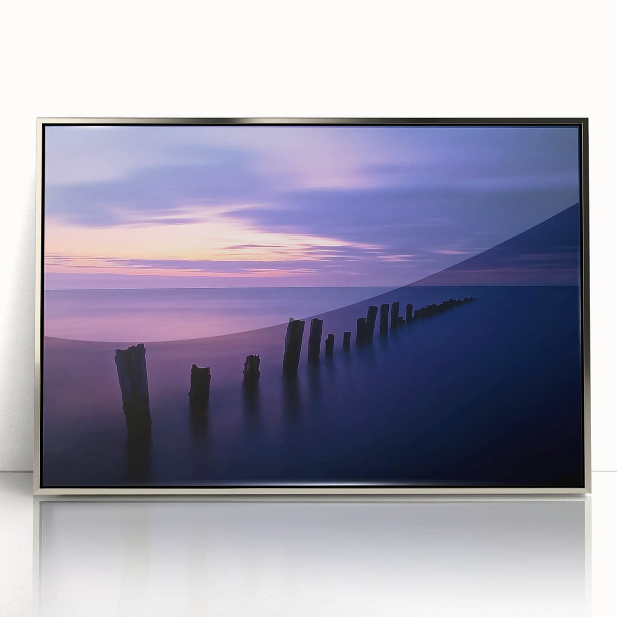Framed acrylic artwork showcasing a serene beach landscape with vibrant colors and silver accents, perfect for enhancing home decor and coastal-themed interiors.