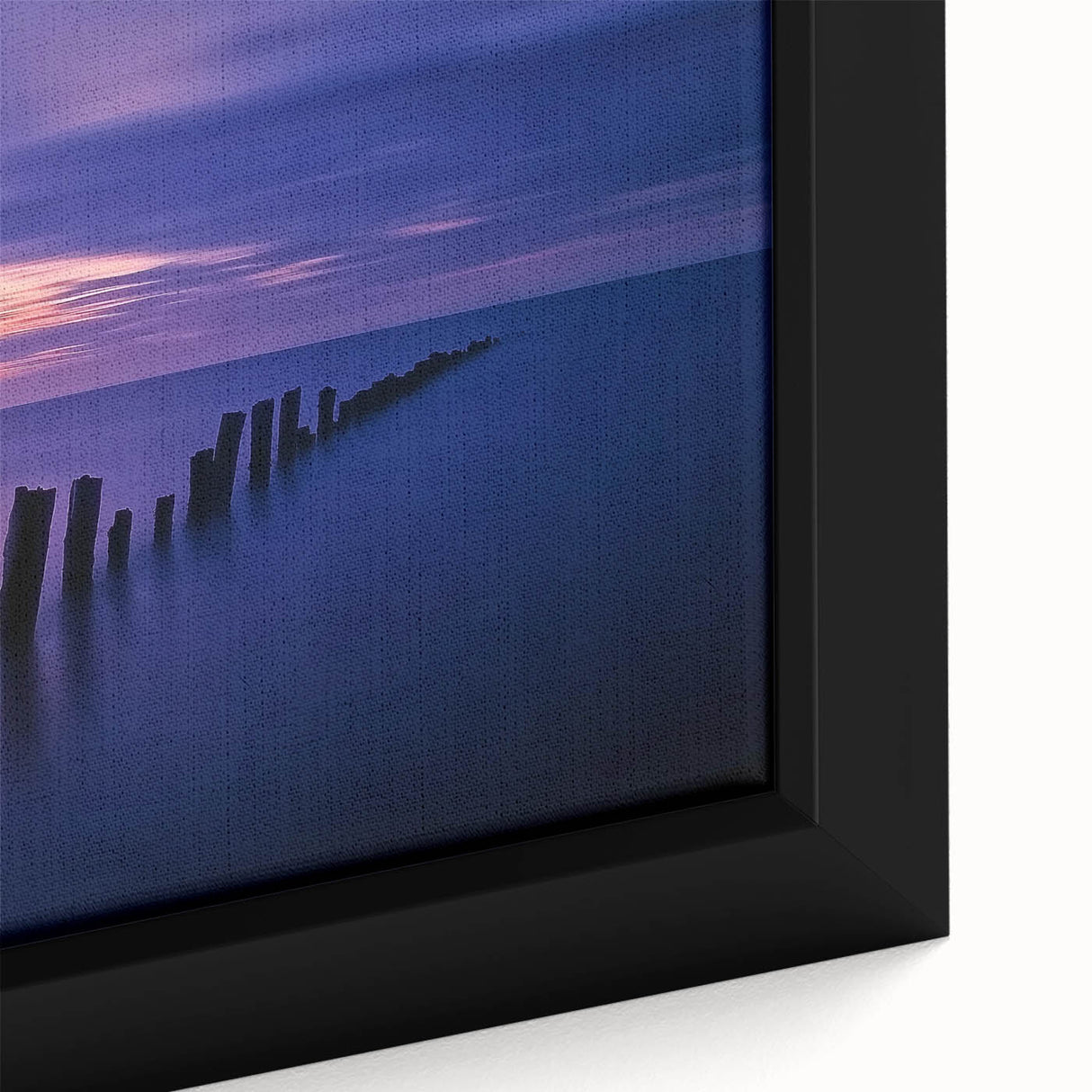 Framed canvas artwork showcasing a vibrant beach landscape with turquoise waters and golden sands, ideal for coastal home decor. This close-up highlights the textured surface and detailed brushstrokes that enhance visual depth.