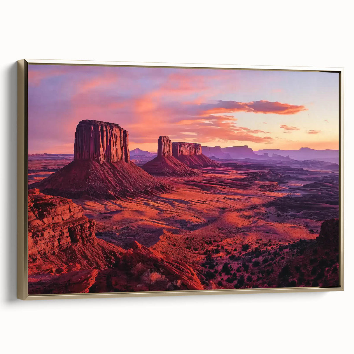 Framed canvas artwork depicting a vibrant landscape of canyons, featuring rich earthy tones and a gold frame, ideal for enhancing home decor aesthetics.