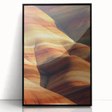 Framed acrylic artwork showcasing a vibrant desert landscape with bold colors and intricate details, set against a sleek black frame, ideal for modern decor.