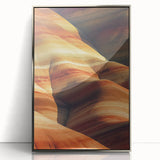 Framed acrylic artwork depicting a vibrant desert landscape, showcasing rich colors and intricate details, displayed from a front view with a sleek silver frame.