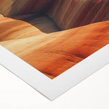 Desert landscape rolled canvas art showcasing vibrant hues of orange and yellow, depicting a serene sunset over dunes, packaged in a durable tube for delivery.