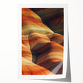 Desert landscape rolled canvas print showcasing vibrant hues of orange and yellow, depicting a serene sunset over dunes, ideal for home decor or art lovers.