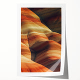Desert landscape rolled canvas print showcasing vibrant hues of orange and yellow, depicting a serene sunset over dunes, ideal for home decor or art lovers.