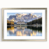 Elegant silver-framed landscape artwork featuring a majestic castle, presented with a white mat for added depth, perfect for home decor enthusiasts seeking a classic touch.