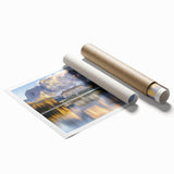 Rolled print showcasing a vibrant landscape with a majestic castle surrounded by lush greenery, elegantly packaged in a sturdy cardboard tube for safe shipping.