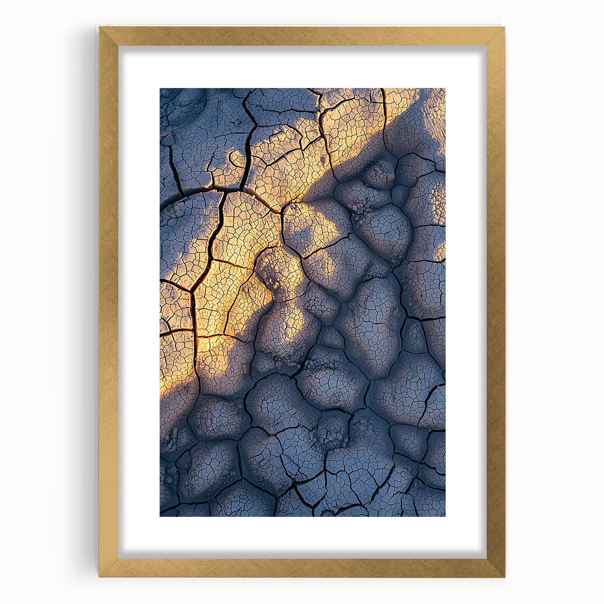 Elegant gold-framed landscape artwork showcasing majestic cliffs, adorned with a white mat for a polished look, perfect for enhancing home decor. Ideal for nature lovers and art enthusiasts.
