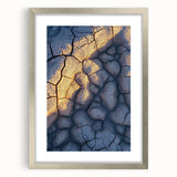 Framed landscape artwork depicting dramatic cliffs in a silver mat, showcasing natural beauty with vibrant colors, perfect for home decor or art enthusiasts.