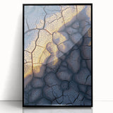 Framed acrylic artwork showcasing a stunning cliff landscape with vivid colors, set against a black frame, perfect for modern home decor. This piece adds a bold artistic touch to any living space.