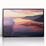 Framed acrylic artwork showcasing a vibrant beach landscape with deep blue waters and golden sands, presented in a sleek black frame for modern decor. Perfect for enhancing living spaces with a coastal vibe.