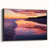 Framed canvas artwork showcasing a serene beach landscape with vibrant colors, presented in a sleek black frame, ideal for home decor and coastal-themed interiors.