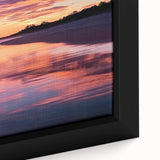 Framed canvas print showcasing a serene beach landscape in vibrant colors, emphasizing the gentle waves and soft sand, perfect for coastal decor enthusiasts.