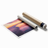 Stunning landscape canvas print showcasing a serene beach scene with soft waves and a vibrant sunset, rolled neatly for easy display and shipping.