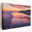 Stretched canvas artwork showcasing a vibrant beach landscape with vivid colors, displayed in a side view to highlight its depth and texture, perfect for coastal decor.
