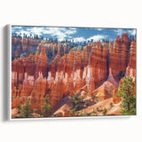 Framed canvas artwork showcasing a vibrant landscape of canyons, featuring rich earthy tones and intricate details, ideal for modern home decor.