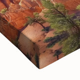 Close-up of a stretched canvas showcasing a vibrant landscape of canyons, highlighting rich colors and intricate details, ideal for home decor enthusiasts.