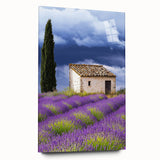 Acrylic landscape artwork depicting a serene countryside scene with vibrant green fields and a clear blue sky, showcased in a glass frame without pins.