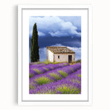 Framed landscape artwork depicting a serene countryside scene, featuring vibrant greens and blues, with a white mat and frame, ideal for home decor.