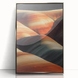 Framed acrylic artwork depicting a vibrant desert landscape with silver accents, showcasing warm hues of orange and yellow against a clear blue sky, perfect for modern home decor.