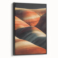 Framed canvas artwork showcasing a stunning desert landscape with vibrant colors, set against a sleek black frame, ideal for modern home decor. Perfect for adding a touch of natural beauty to any space.