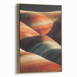 Framed canvas artwork depicting a stunning desert landscape with golden hues and intricate details, ideal for home decor or office settings.