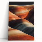 Desert landscape stretched canvas art print showcasing vibrant orange and yellow hues, leaning against a neutral wall, perfect for modern home decor.