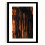 Extra large abstract art print with vibrant autumn hues on textured canvas, framed in black, ideal for living room decor.