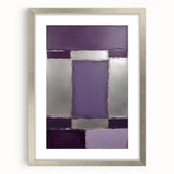 Abstract wall art featuring bold strokes in shades of blue, pink, and gold, framed with a sleek silver mat, ideal for modern home decor. Perfect for enhancing living spaces.