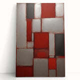 Abstract wall art featuring vibrant strokes in shades of blue, orange, and yellow, displayed on a stretched canvas, leaning against a neutral wall, perfect for modern decor.