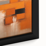 Close-up of framed canvas wall art showcasing abstract strokes in vibrant colors of blue, orange, and yellow, perfect for modern home decor.