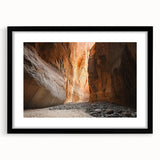 Framed landscape artwork depicting a serene cave scene, featuring a black mat border and sleek black frame, perfect for modern home decor and nature enthusiasts.