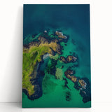 Stretched canvas artwork showcasing a stunning landscape of dramatic cliffs against a vibrant sky, perfect for enhancing home decor with natural beauty.