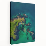 Stretched canvas artwork depicting a dramatic landscape of rugged cliffs with vivid colors and intricate details, ideal for enhancing home decor or office spaces.