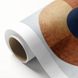 Abstract geometric rolled canvas art showcasing vibrant blue and orange shapes against a textured background, ideal for modern home decor.