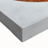 Close-up of an abstract geometric stretched canvas artwork showcasing vibrant shapes in shades of blue, orange, and yellow, perfect for modern home decor.